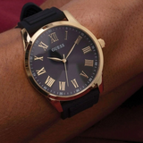 Guess • U0972G2 • Black and Gold-Tone Oversized Watch